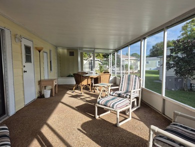 This 1982 2 bed 2 bath is in a 55+ Spanish lakes community. It on Spanish Lakes Country Club in Florida - for sale on GolfHomes.com, golf home, golf lot