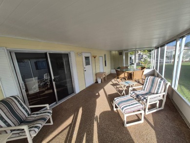 This 1982 2 bed 2 bath is in a 55+ Spanish lakes community. It on Spanish Lakes Country Club in Florida - for sale on GolfHomes.com, golf home, golf lot