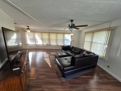 This 1982 2 bed 2 bath is in a 55+ Spanish lakes community. It on Spanish Lakes Country Club in Florida - for sale on GolfHomes.com, golf home, golf lot