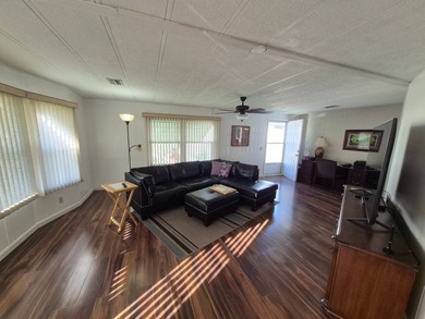 This 1982 2 bed 2 bath is in a 55+ Spanish lakes community. It on Spanish Lakes Country Club in Florida - for sale on GolfHomes.com, golf home, golf lot