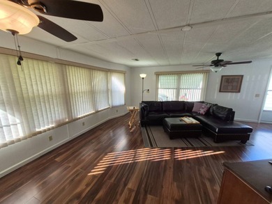 This 1982 2 bed 2 bath is in a 55+ Spanish lakes community. It on Spanish Lakes Country Club in Florida - for sale on GolfHomes.com, golf home, golf lot