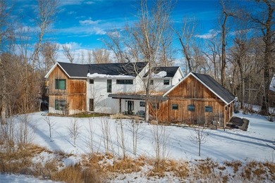 Inspired design that harmonizes modern luxury within nature's on Cottonwood Hills Golf Course - Cottonwood Hills in Montana - for sale on GolfHomes.com, golf home, golf lot