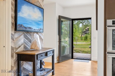 Inspired design that harmonizes modern luxury within nature's on Cottonwood Hills Golf Course - Cottonwood Hills in Montana - for sale on GolfHomes.com, golf home, golf lot