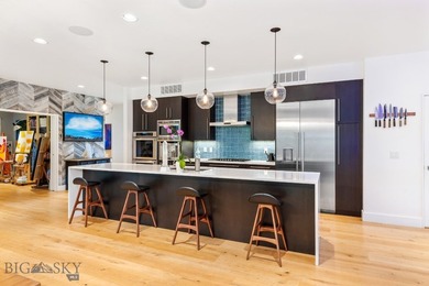 Inspired design that harmonizes modern luxury within nature's on Cottonwood Hills Golf Course - Cottonwood Hills in Montana - for sale on GolfHomes.com, golf home, golf lot