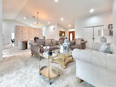 Hurry and take a look at this tropical, spacious pool home in La on Woodmont Country Club in Florida - for sale on GolfHomes.com, golf home, golf lot