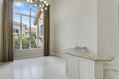 Beautiful home with a waterfront and golf course view! This home on Jupiter Country Club in Florida - for sale on GolfHomes.com, golf home, golf lot