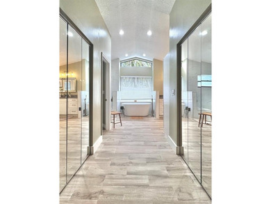 Hurry and take a look at this tropical, spacious pool home in La on Woodmont Country Club in Florida - for sale on GolfHomes.com, golf home, golf lot