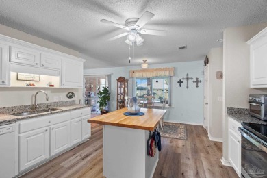 Discover this 4-bedroom, 3-bath home in the established Perdido on Perdido Bay Golf Club in Florida - for sale on GolfHomes.com, golf home, golf lot