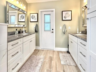 Hurry and take a look at this tropical, spacious pool home in La on Woodmont Country Club in Florida - for sale on GolfHomes.com, golf home, golf lot