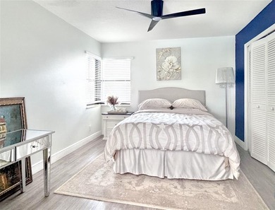 Hurry and take a look at this tropical, spacious pool home in La on Woodmont Country Club in Florida - for sale on GolfHomes.com, golf home, golf lot