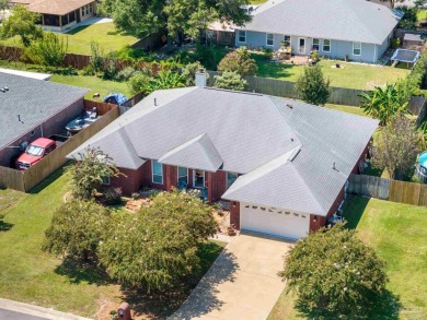 Discover this 4-bedroom, 3-bath home in the established Perdido on Perdido Bay Golf Club in Florida - for sale on GolfHomes.com, golf home, golf lot