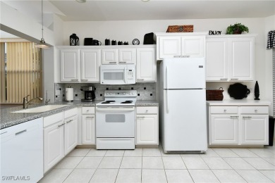 Turnkey twin villa with extended lanai overlooking the golf on Westminster Golf Club in Florida - for sale on GolfHomes.com, golf home, golf lot