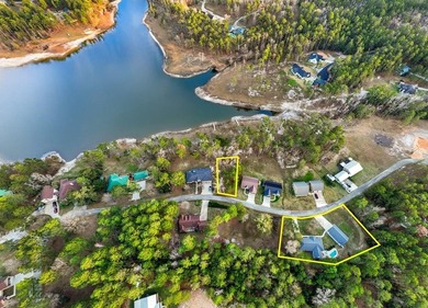 Discover your lakeside gem, a charming 3-bed, 2-bath home on on Rayburn Country Club in Texas - for sale on GolfHomes.com, golf home, golf lot