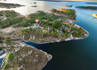 Discover your lakeside gem, a charming 3-bed, 2-bath home on on Rayburn Country Club in Texas - for sale on GolfHomes.com, golf home, golf lot