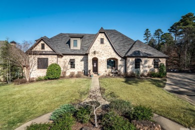 This stunning residence is in the sought-after Arbors gated on Chenal Country Club - Bear Den Mountain in Arkansas - for sale on GolfHomes.com, golf home, golf lot