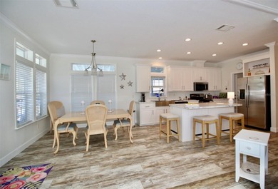 **GOLDEN GATE'S TAJ MAHAL** Magnificent 2 bedroom, 2 full bath on Mainlands Golf Club in Florida - for sale on GolfHomes.com, golf home, golf lot