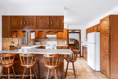 Welcome to Casa Solara -- a custom-built California on Colonial Country Club in New York - for sale on GolfHomes.com, golf home, golf lot
