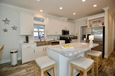 **GOLDEN GATE'S TAJ MAHAL** Magnificent 2 bedroom, 2 full bath on Mainlands Golf Club in Florida - for sale on GolfHomes.com, golf home, golf lot