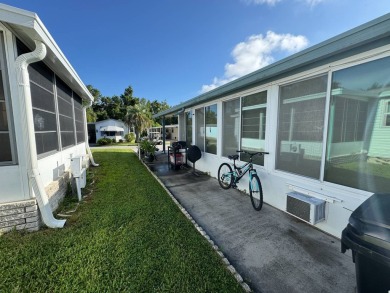 Look no further than this fully renovated, well-maintained 2b/2b on Lake Henry Golf Club in Florida - for sale on GolfHomes.com, golf home, golf lot