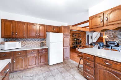Welcome to Casa Solara -- a custom-built California on Colonial Country Club in New York - for sale on GolfHomes.com, golf home, golf lot