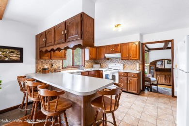 Welcome to Casa Solara -- a custom-built California on Colonial Country Club in New York - for sale on GolfHomes.com, golf home, golf lot
