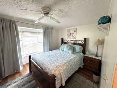 Look no further than this fully renovated, well-maintained 2b/2b on Lake Henry Golf Club in Florida - for sale on GolfHomes.com, golf home, golf lot