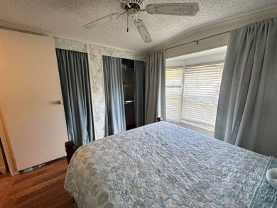 Look no further than this fully renovated, well-maintained 2b/2b on Lake Henry Golf Club in Florida - for sale on GolfHomes.com, golf home, golf lot
