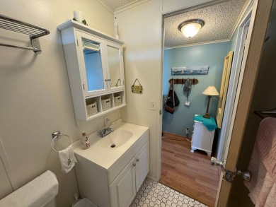 Look no further than this fully renovated, well-maintained 2b/2b on Lake Henry Golf Club in Florida - for sale on GolfHomes.com, golf home, golf lot