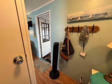 Look no further than this fully renovated, well-maintained 2b/2b on Lake Henry Golf Club in Florida - for sale on GolfHomes.com, golf home, golf lot