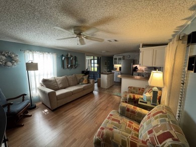 Look no further than this fully renovated, well-maintained 2b/2b on Lake Henry Golf Club in Florida - for sale on GolfHomes.com, golf home, golf lot