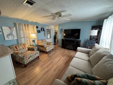 Look no further than this fully renovated, well-maintained 2b/2b on Lake Henry Golf Club in Florida - for sale on GolfHomes.com, golf home, golf lot