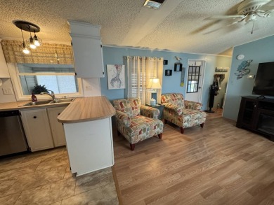 Look no further than this fully renovated, well-maintained 2b/2b on Lake Henry Golf Club in Florida - for sale on GolfHomes.com, golf home, golf lot