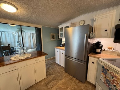 Look no further than this fully renovated, well-maintained 2b/2b on Lake Henry Golf Club in Florida - for sale on GolfHomes.com, golf home, golf lot