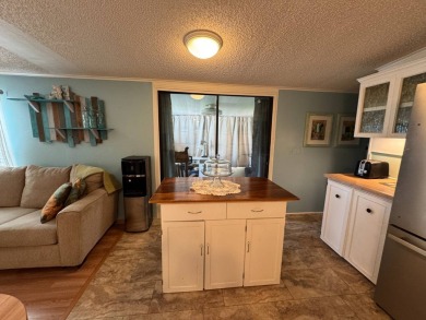 Look no further than this fully renovated, well-maintained 2b/2b on Lake Henry Golf Club in Florida - for sale on GolfHomes.com, golf home, golf lot