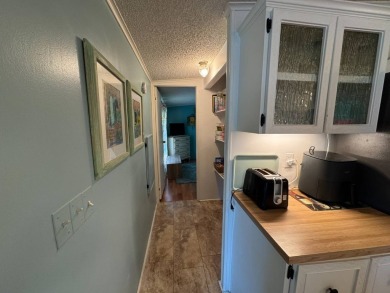 Look no further than this fully renovated, well-maintained 2b/2b on Lake Henry Golf Club in Florida - for sale on GolfHomes.com, golf home, golf lot