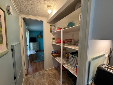 Look no further than this fully renovated, well-maintained 2b/2b on Lake Henry Golf Club in Florida - for sale on GolfHomes.com, golf home, golf lot