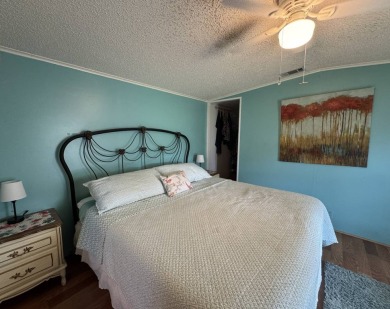 Look no further than this fully renovated, well-maintained 2b/2b on Lake Henry Golf Club in Florida - for sale on GolfHomes.com, golf home, golf lot