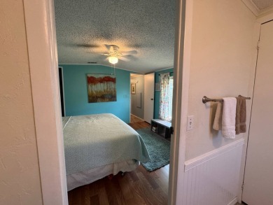 Look no further than this fully renovated, well-maintained 2b/2b on Lake Henry Golf Club in Florida - for sale on GolfHomes.com, golf home, golf lot
