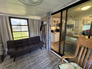 Look no further than this fully renovated, well-maintained on Lake Henry Golf Club in Florida - for sale on GolfHomes.com, golf home, golf lot