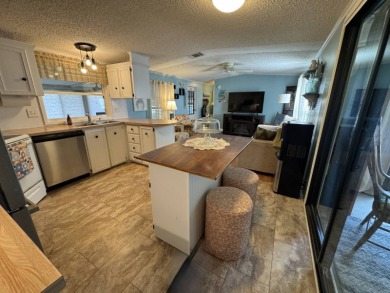 Look no further than this fully renovated, well-maintained on Lake Henry Golf Club in Florida - for sale on GolfHomes.com, golf home, golf lot