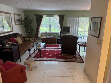SPACIOUS ONE BEDROOM & ONE & A HALF BATH CONDO LOCATED ON THE on The Diplomat Golf Resort and Spa in Florida - for sale on GolfHomes.com, golf home, golf lot
