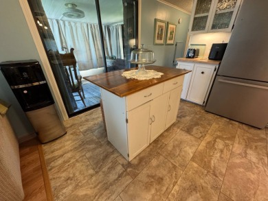 Look no further than this fully renovated, well-maintained on Lake Henry Golf Club in Florida - for sale on GolfHomes.com, golf home, golf lot