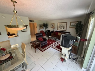 SPACIOUS ONE BEDROOM & ONE & A HALF BATH CONDO LOCATED ON THE on The Diplomat Golf Resort and Spa in Florida - for sale on GolfHomes.com, golf home, golf lot