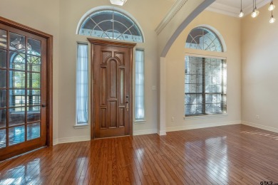 Located in Hollytree, this stunning home offers 4 spacious on Hollytree Country Club in Texas - for sale on GolfHomes.com, golf home, golf lot