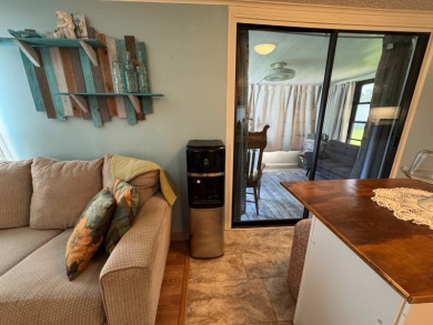 Look no further than this fully renovated, well-maintained on Lake Henry Golf Club in Florida - for sale on GolfHomes.com, golf home, golf lot