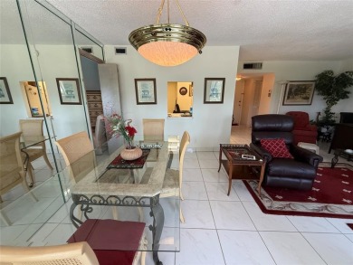 SPACIOUS ONE BEDROOM & ONE & A HALF BATH CONDO LOCATED ON THE on The Diplomat Golf Resort and Spa in Florida - for sale on GolfHomes.com, golf home, golf lot