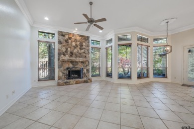 Located in Hollytree, this stunning home offers 4 spacious on Hollytree Country Club in Texas - for sale on GolfHomes.com, golf home, golf lot