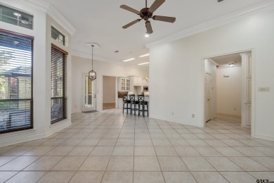 Located in Hollytree, this stunning home offers 4 spacious on Hollytree Country Club in Texas - for sale on GolfHomes.com, golf home, golf lot