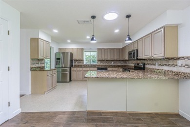 MOVE RIGHT IN and enjoy this 55+ guard-gated community of Tampa on Tampa Bay Golf and Country Club in Florida - for sale on GolfHomes.com, golf home, golf lot
