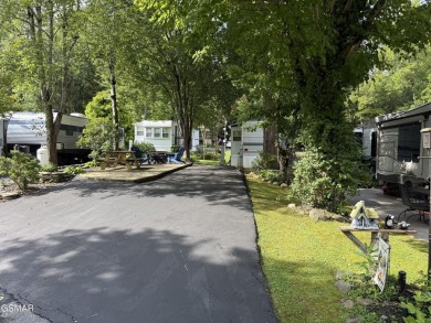 Beautifully landscaped RV Lot in the sought after Outdoor on Bent Creek Golf Course in Tennessee - for sale on GolfHomes.com, golf home, golf lot